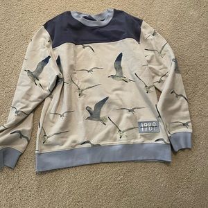 Official Taylor Swift seagull sweatshirt size M.